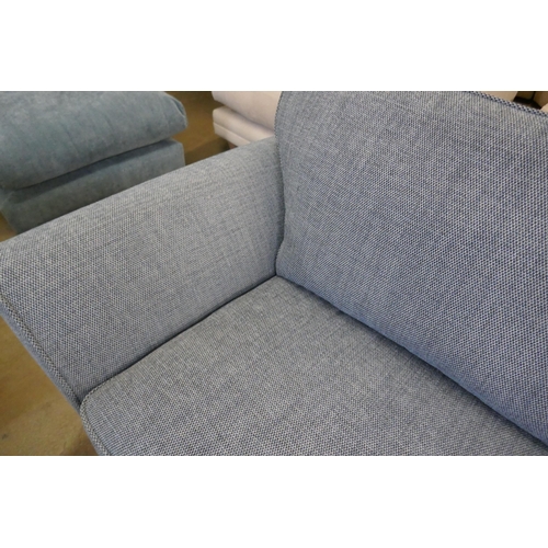 1564 - A Mina blue three seater sofa