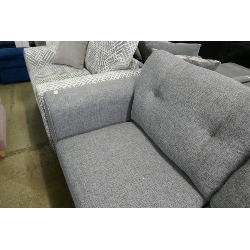 1582 - A Briggs Sparr grey three seater sofa