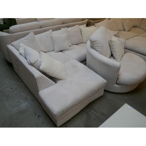 1597 - An ivory jumbo cord corner sofa and swivel armchair