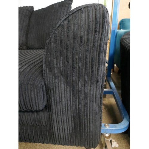 1601 - A black jumbo cord three seater and two seater sofa