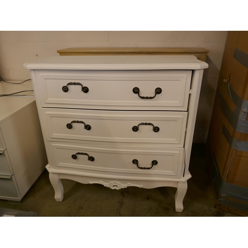 1603 - A white three drawer chest - damaged