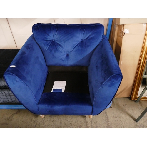 1607 - A blue velvet three seater sofa, armchair and footstool - damaged