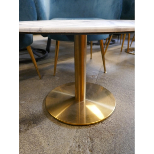 1633 - A low circular coffee table, marble effect, with two blue velvet tub chairs