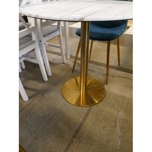 1634 - A circular table, marble effect with two two blue velvet upholstered chairs