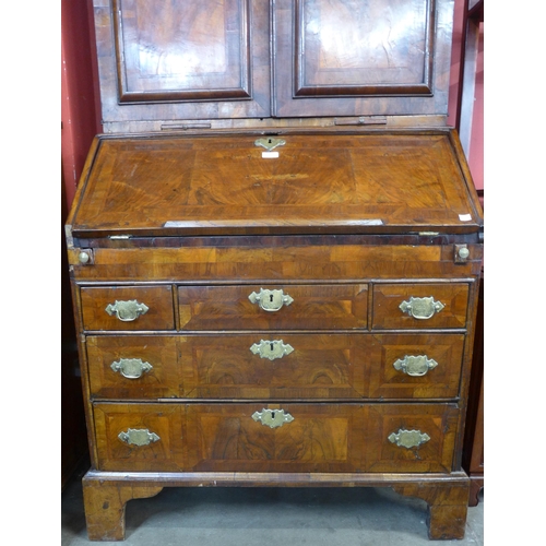 103 - A George I walnut bureau bookcase