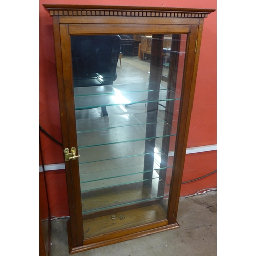 105 - A mahogany display cabinet