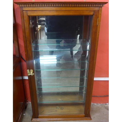 105 - A mahogany display cabinet