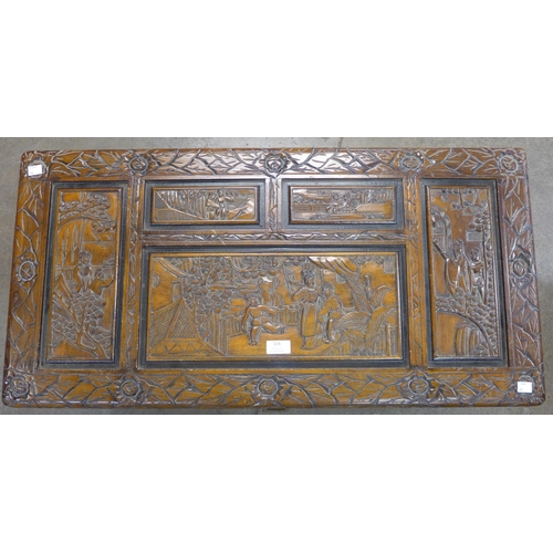 114 - An eastern carved camphorwood blanket box