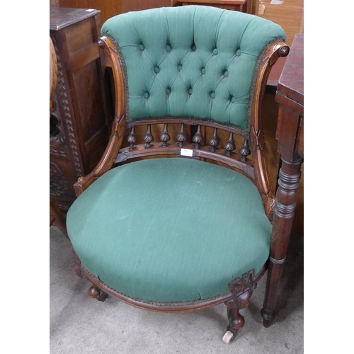 125 - A Victorian carved walnut and green fabric upholstered lady's chair