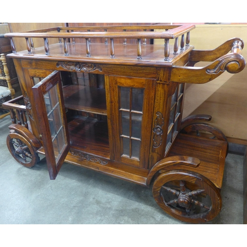 127 - A carriage shaped hardwood cocktail trolley