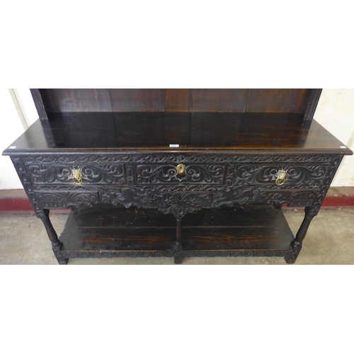 134 - A 17th Century and later carved oak dresser