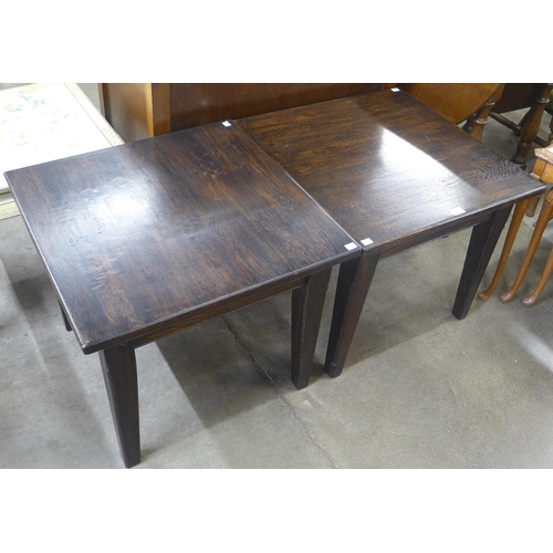 147 - A pair of elm lamp tables