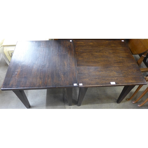 147 - A pair of elm lamp tables