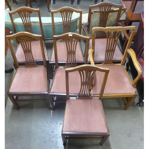 156 - A Regency style mahogany dining table and seven George IV style chairs