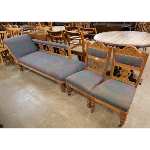 164 - A Victorian oak and fabric  upholstered chaise longue and pair of matching chairs