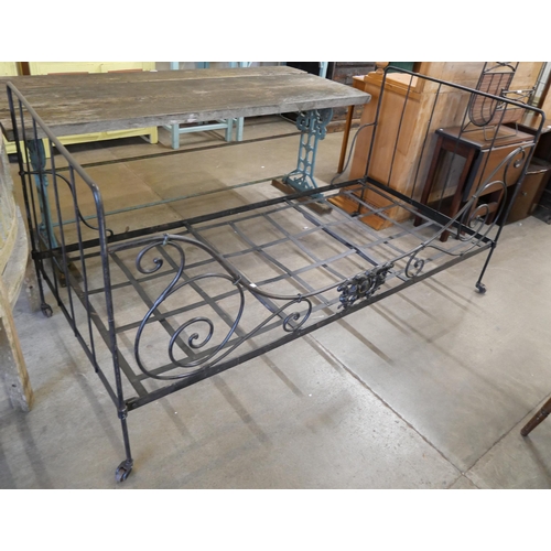 175 - A 19th century French wrought iron bed