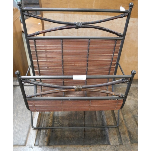 177 - A wrought iron and wicker magazine rack