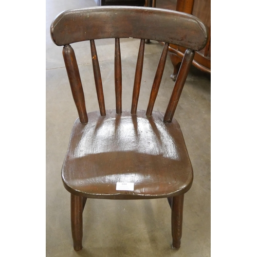 184 - A Victorian elm child's farmhouse chair