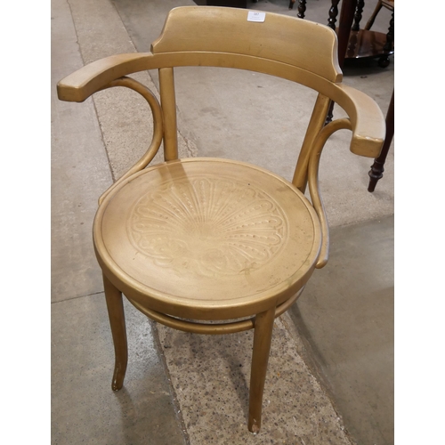 187 - A gilt painted bentwood armchair