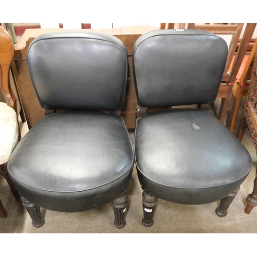 192 - A pair of Victorian mahogany and black leather upholstered side chairs