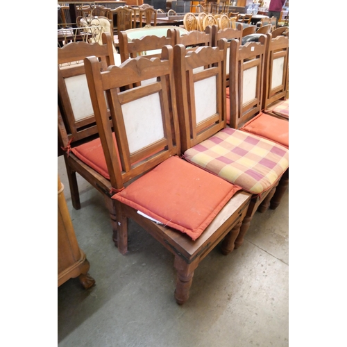 197 - An eastern hardwood and marble topped dining table and chairs