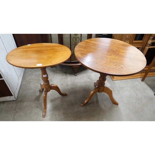 209 - Two Victorian walnut tripod tables