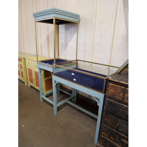 218 - Two painted pine and brass display cabinets