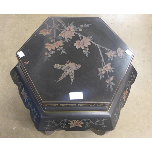 222 - A Chinese black chinoiserie lacquered octagonal occasional table