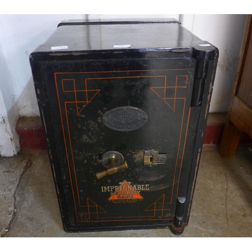 224 - A Victorian Withers & Sons cast iron safe (with key)