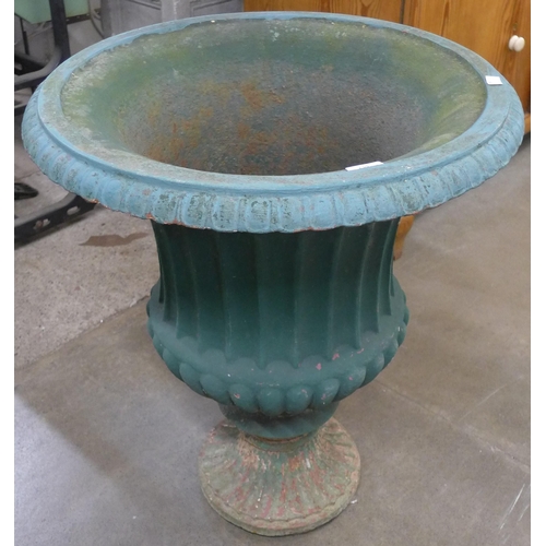 234 - A large Victorian style cast iron campana shaped garden urn