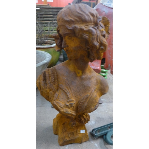 267 - A cast iron bust of an Art Nouveau style lady