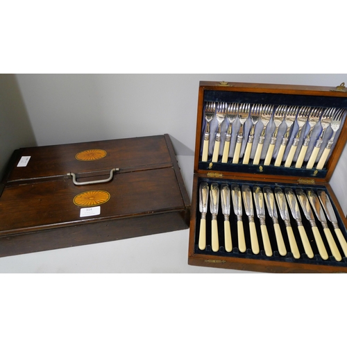 314 - A cased set of silver plated and faux ivory handled fish knives and forks and an inlaid oak cutlery ... 