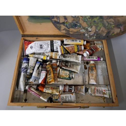 322 - An artists easel and oils