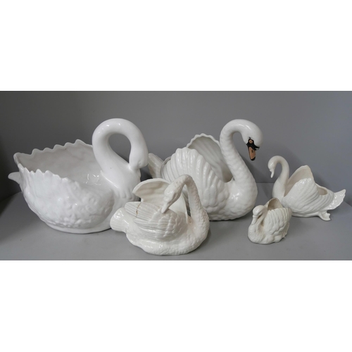 328 - A set of five graduated porcelain swans