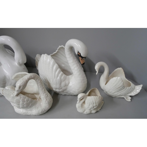 328 - A set of five graduated porcelain swans