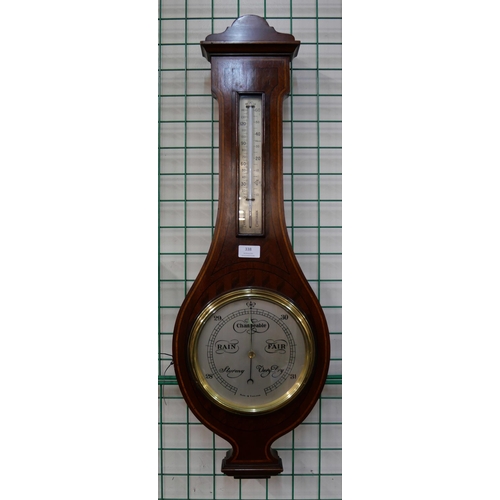 338 - A mahogany aneroid banjo barometer