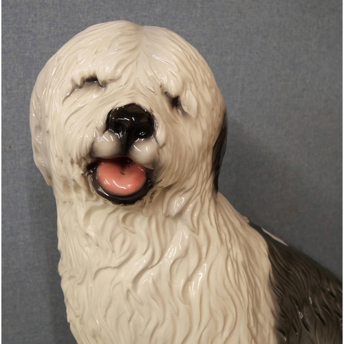 342 - An Italian porcelain fireside English sheepdog and puppy