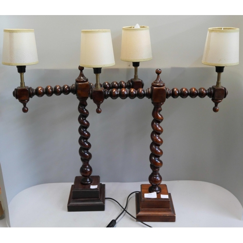 352 - A pair of early 20th Century walnut barleytwist  and bobbin turned table lamps