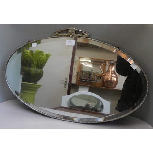 360 - An Art Deco chrome framed oval mirror