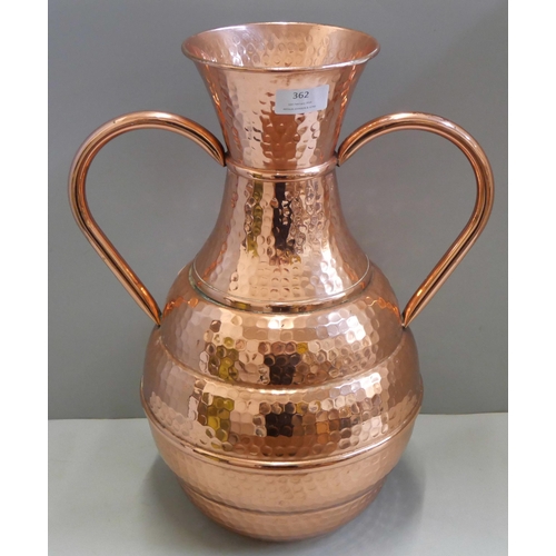 362 - A hammered copper two handled vase