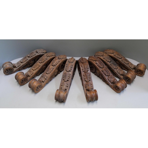 364 - A set of eight 18th Century style carved oak corbels