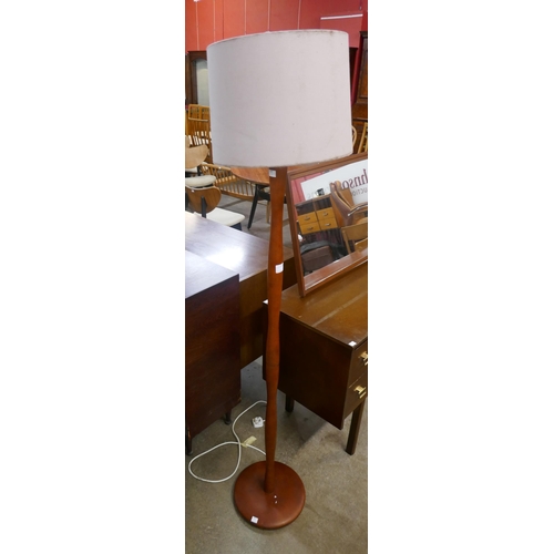 39B - A teak standard lamp
