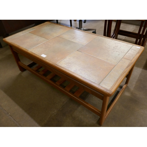 7 - A Danish  teak and tiled top coffee table