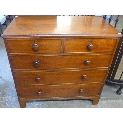 76 - A George III oak chest of drawers