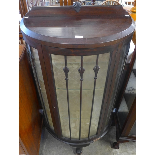 77 - A mahogany single door display cabinet