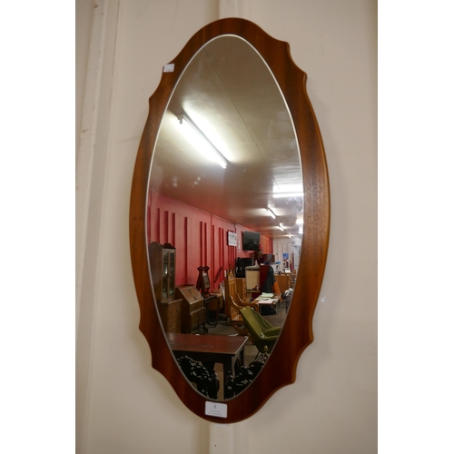 8 - A teak framed mirror