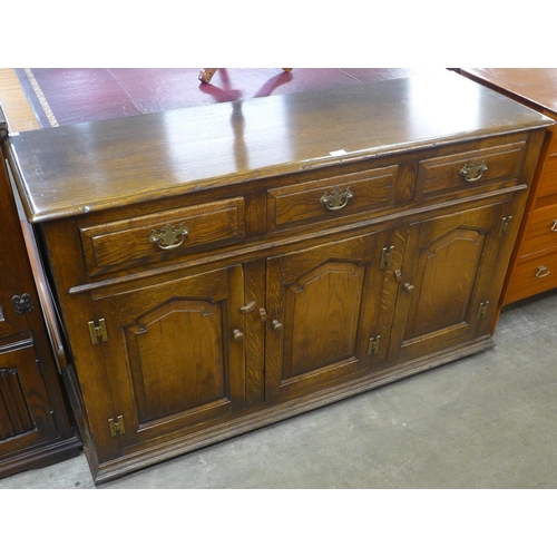 80 - A George III style Ipswich oak dresser