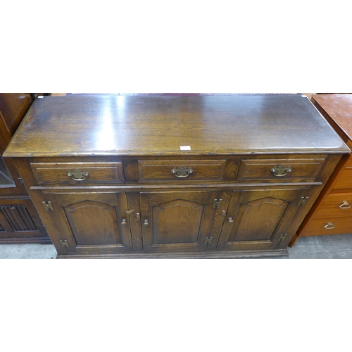 80 - A George III style Ipswich oak dresser