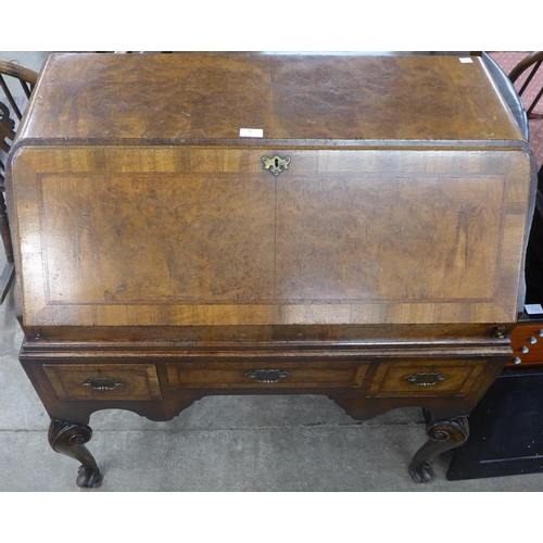 84 - A Queen Anne style walnut bureau de dame