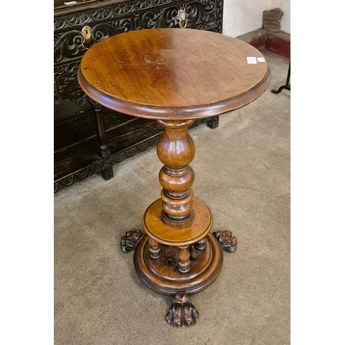 172 - A 19th century walnut circular lamp table